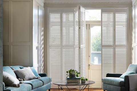 tracked shutters for large areas available from brite blinds in sussex